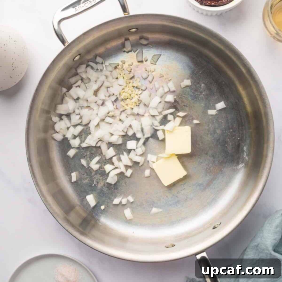 Decadent Lobster Ravioli Sauce 4 Onions and garlic are sauteed in butter.