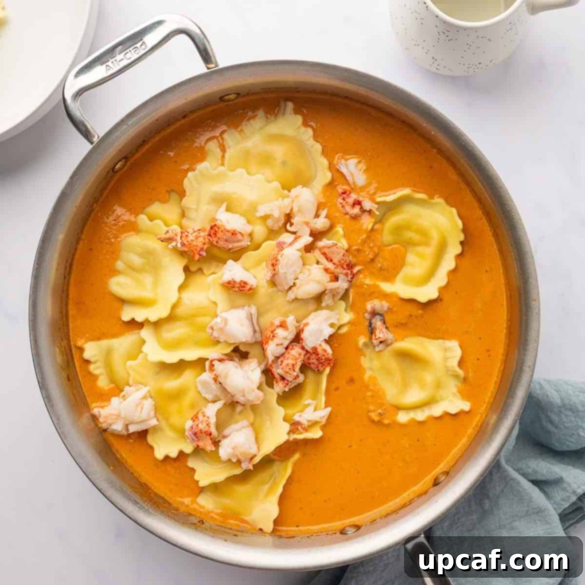 Decadent Lobster Ravioli Sauce 8 Chunks of lobster and cooked ravioli are added to the sauce.