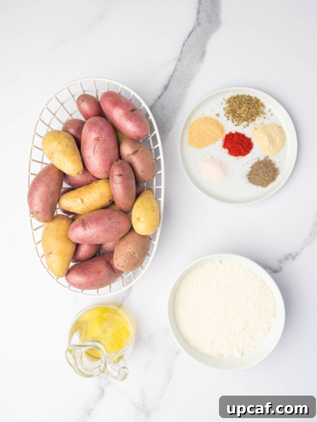 Ingredients needed to make cheesy fingerling potatoes.