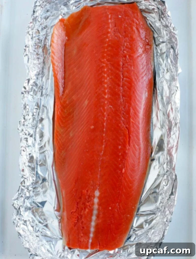 Salmon fillet in foil, ready for marinade
