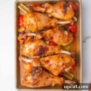 Baked turkey legs on a sheetpan, golden brown and perfectly cooked.