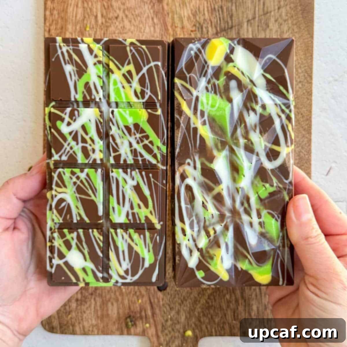 Two Dubai Pistachio Chocolate Bars next to each other.