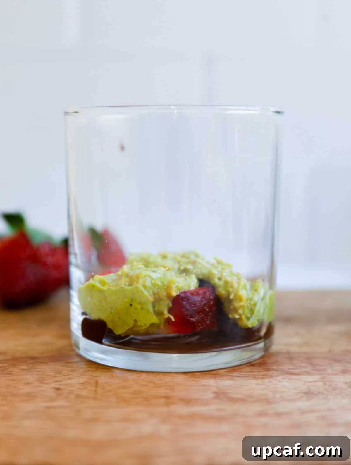 Layering of Dubai Strawberry Cup in a glass cup.