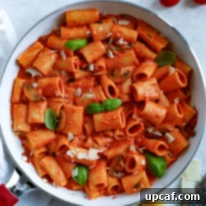 Serving Creamy Red Pepper Rigatoni pasta, beautifully plated