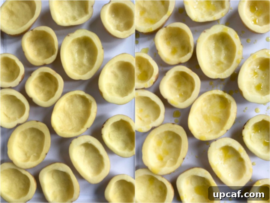 Golden Crisp Potato Shells 2 Close-up shot of potato halves, expertly cored and ready for their first bake, showing the clean edges and sturdy shell.