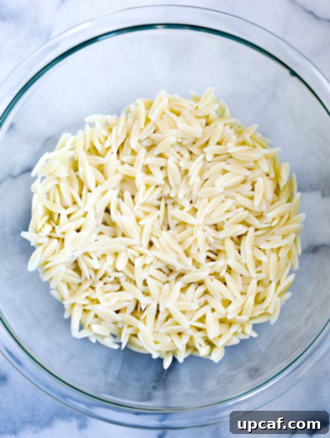 Cooked orzo pasta, ready for the Greek salad