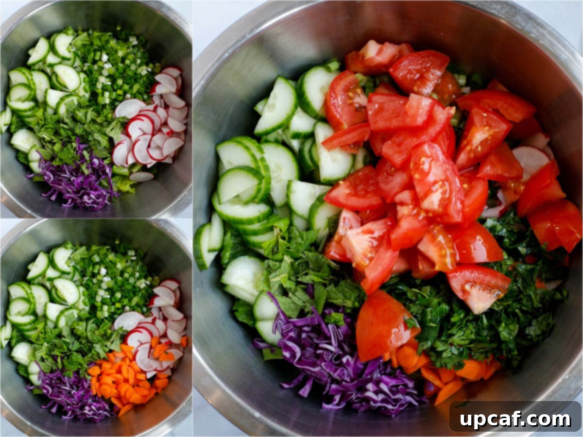 The salad ingredients chopped and mixed in a bowl.