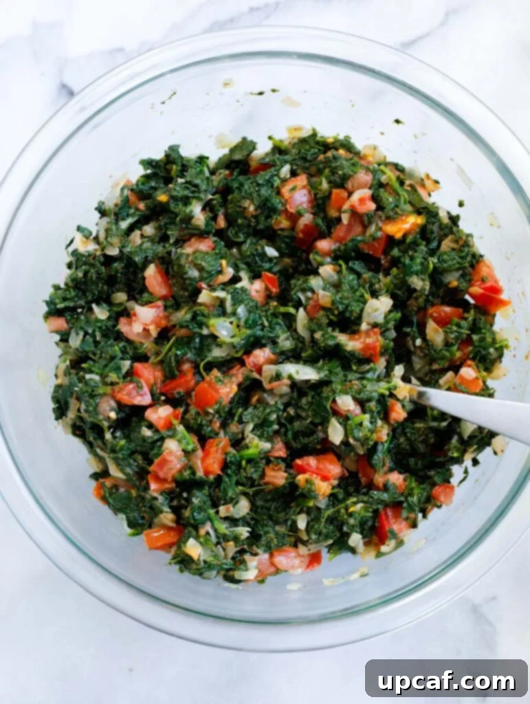finished spinach pie filling in a bowl
