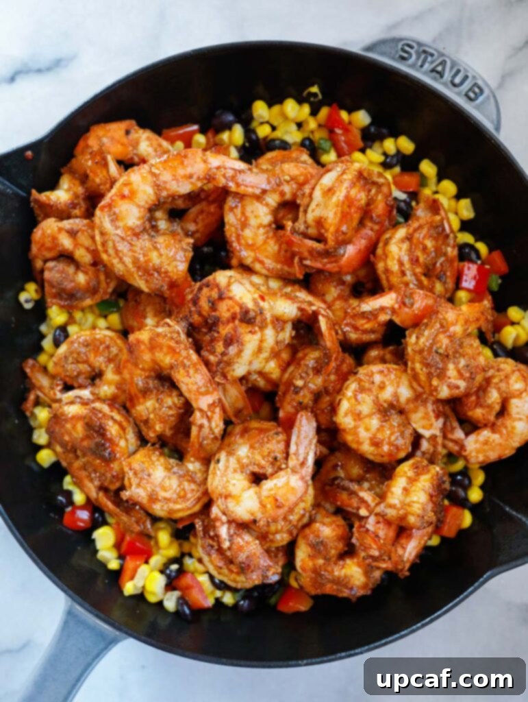 mexican shrimp on top of the veggies