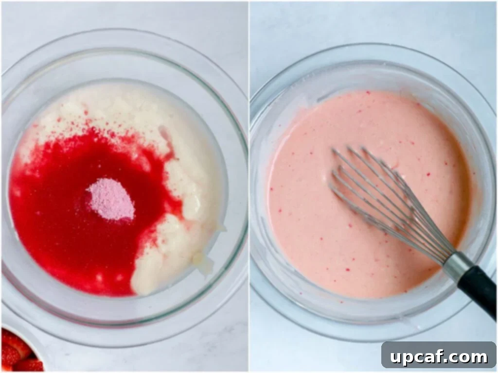 A vibrant bowl of pink strawberry pancake batter, smooth and perfectly mixed, indicating it's ready to be transformed into sweet mini strawberry pancakes.