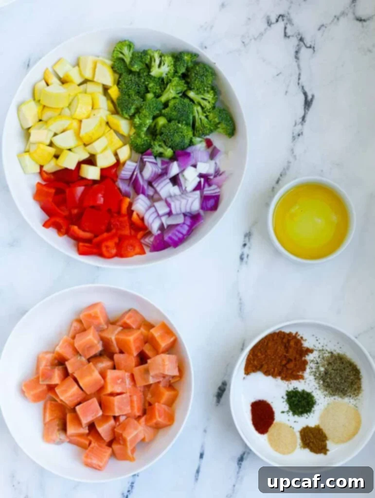Ingredients for Skillet Salmon with Vegetables laid out on a table