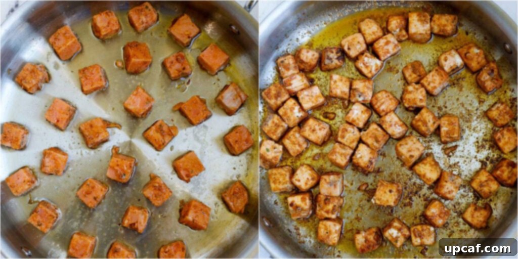 cubed salmon in a skillet