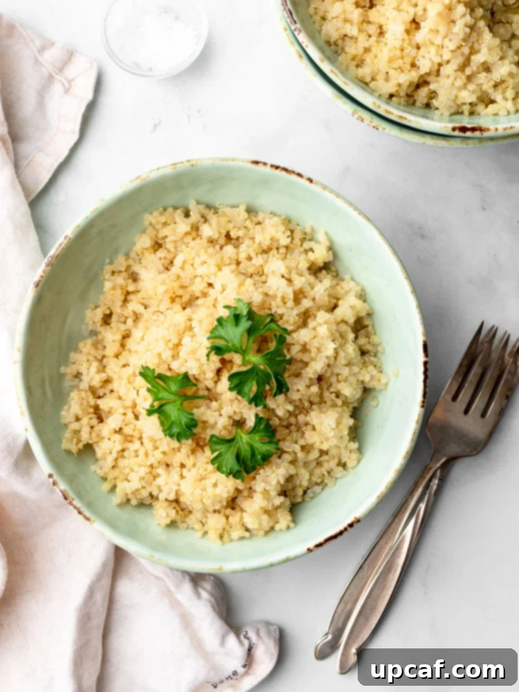 A bowl of fluffy, perfectly cooked quinoa, ready to be enjoyed as a nutritious meal component.