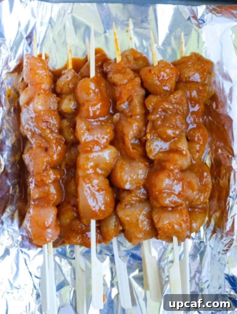 Seoul Street Chicken Skewers 6 Marinated chicken threaded onto skewers, ready for grilling