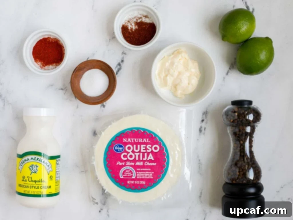Ingredients for the homemade mayo dressing, including mayonnaise, lime, Mexican cream, chili powder, paprika, black pepper, cotija cheese, and olive oil.