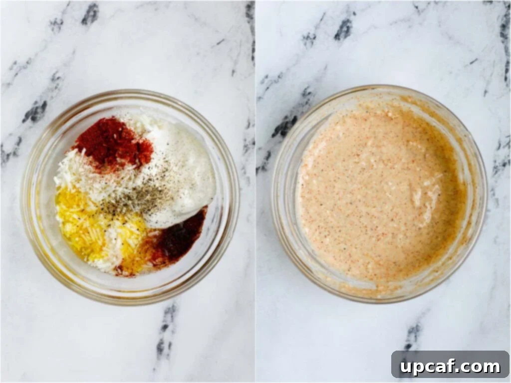 A bowl with the creamy dressing ingredients being whisked together, including mayonnaise, lime juice, and spices.