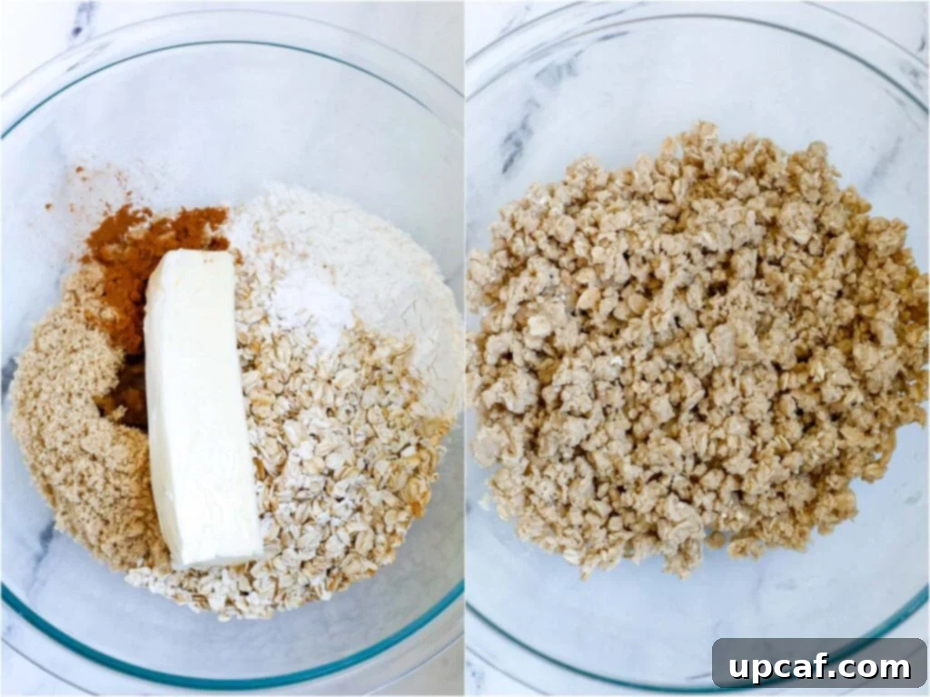 Hands mixing cold butter into dry ingredients like flour, oats, and sugar to form the crumb topping for Blueberry Crisp