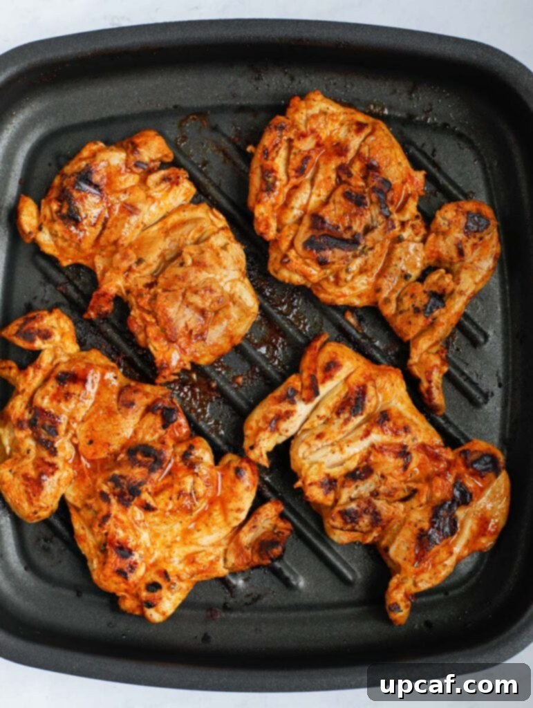 Fajita Fiesta Mac & Cheese 4 Grilling fajita-seasoned chicken in a skillet