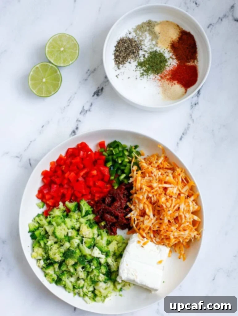 Ingredients for Broccoli and Cheese Stuffed Chicken laid out on a board