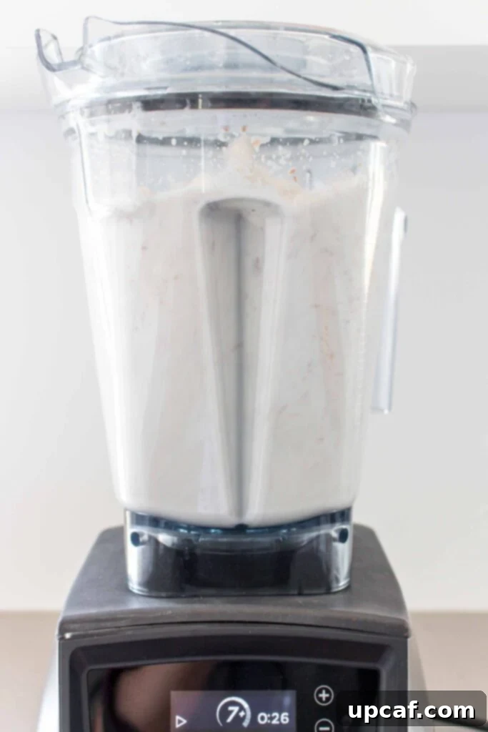 Fresh Almond Milk From Scratch 7 almond milk blending in vitamix