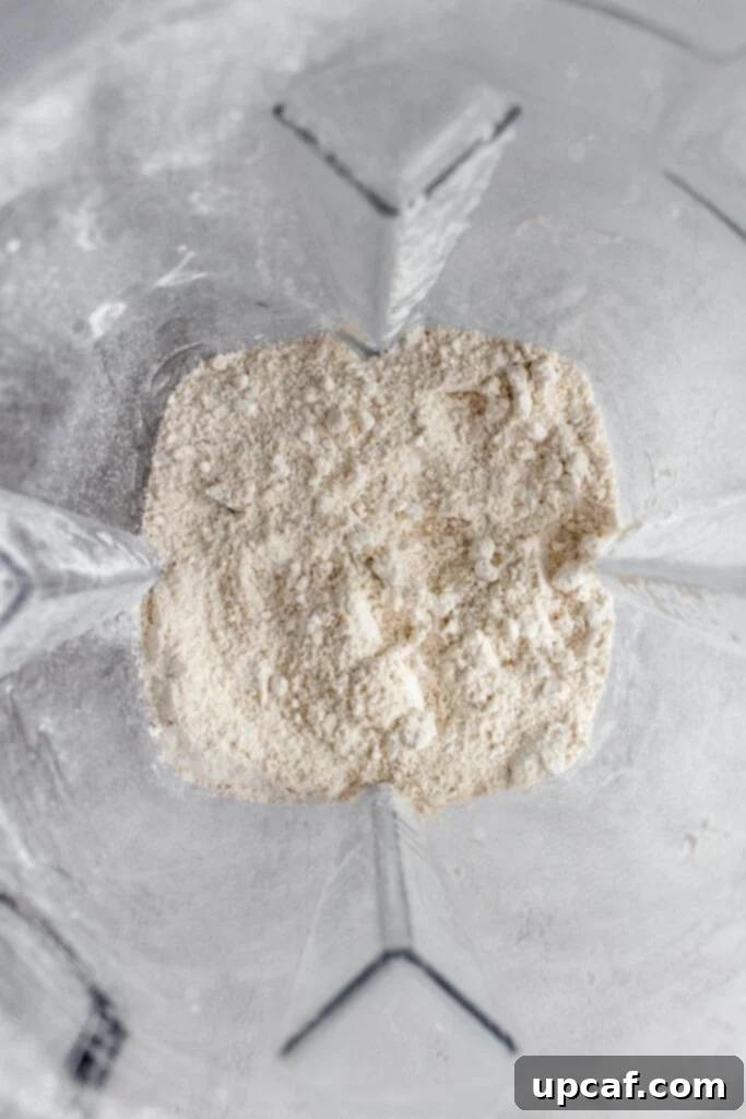 Blender with finely ground oat flour inside.