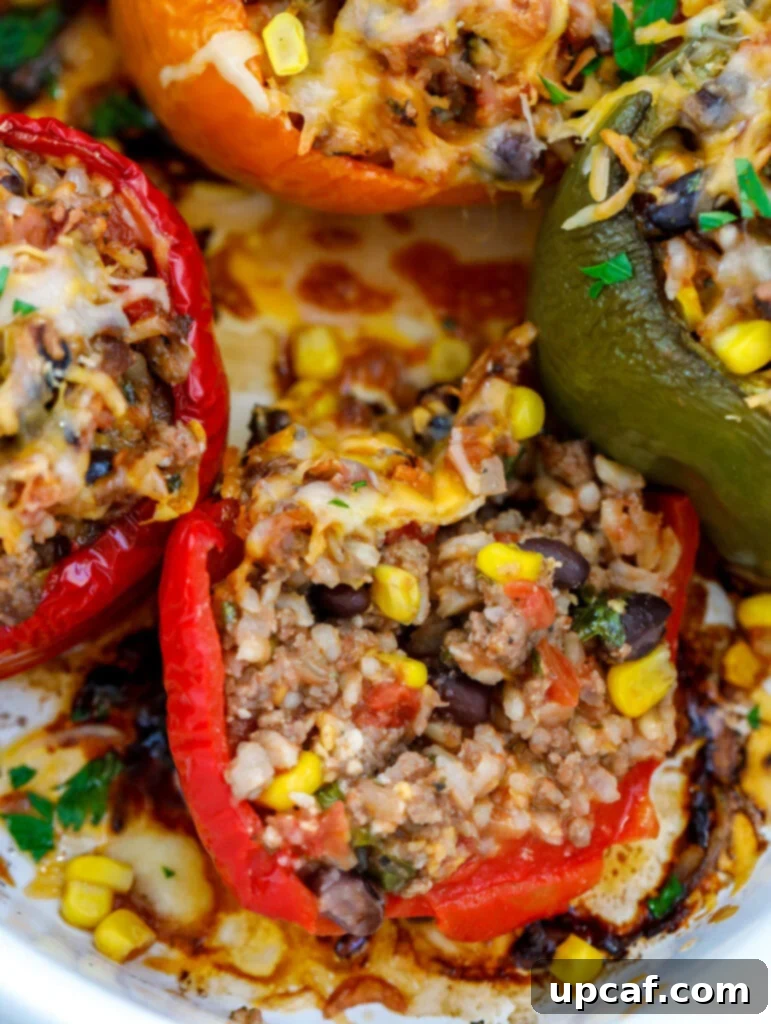 Nutrient-Packed Bell Pepper Boats 7 close up of Healthy Stuffed Peppers in a dish.