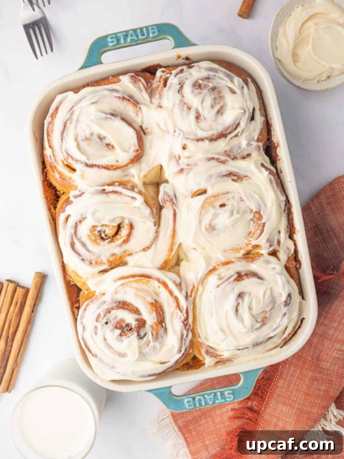 Bakery-Style Cinnamon Rolls: Extra Soft, Gooey, and Irresistibly Creamy 2 Soft and Gooey Frosted Cinnamon Rolls Made with Heavy Cream