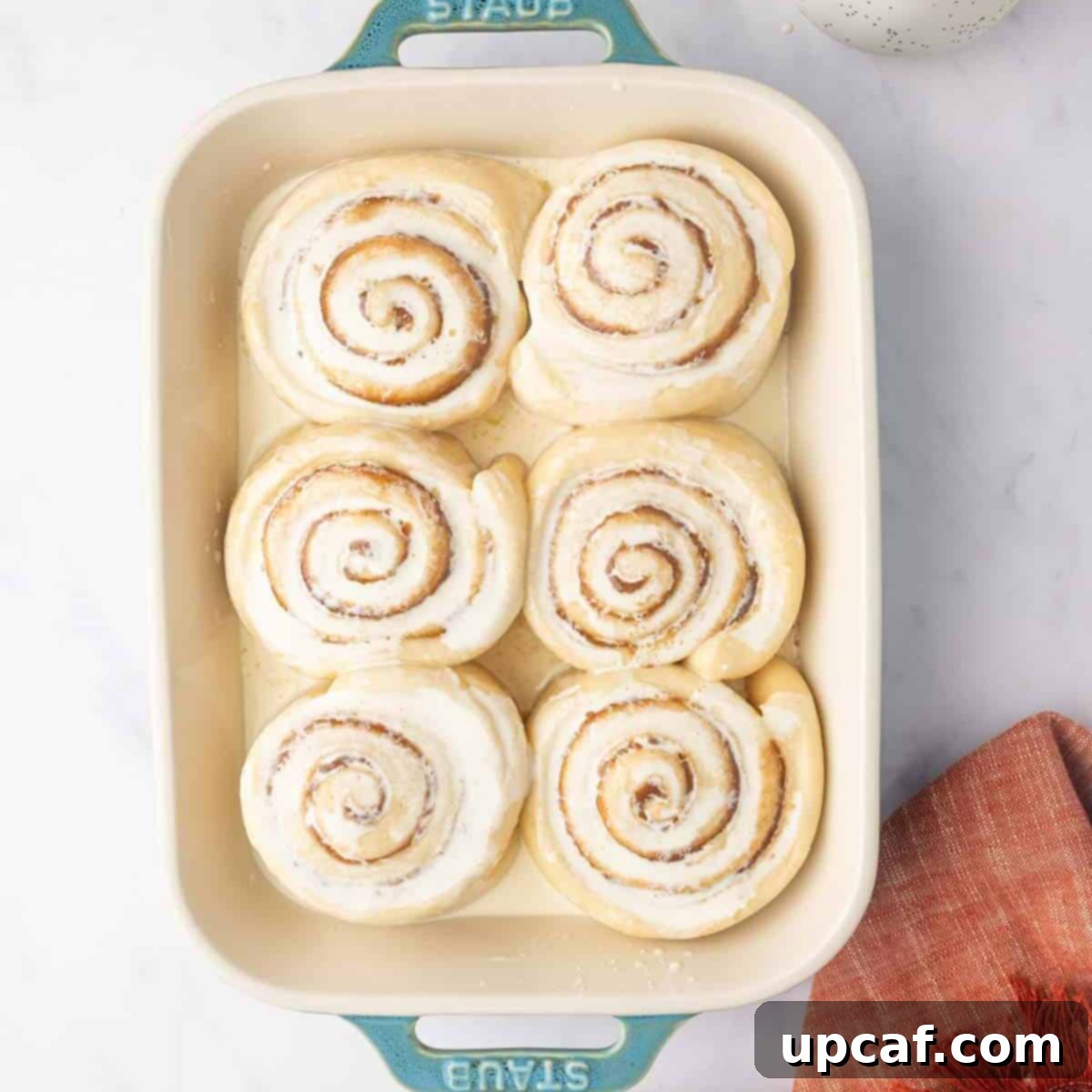Bakery-Style Cinnamon Rolls: Extra Soft, Gooey, and Irresistibly Creamy 13 Pouring Heavy Cream over Unbaked Cinnamon Rolls