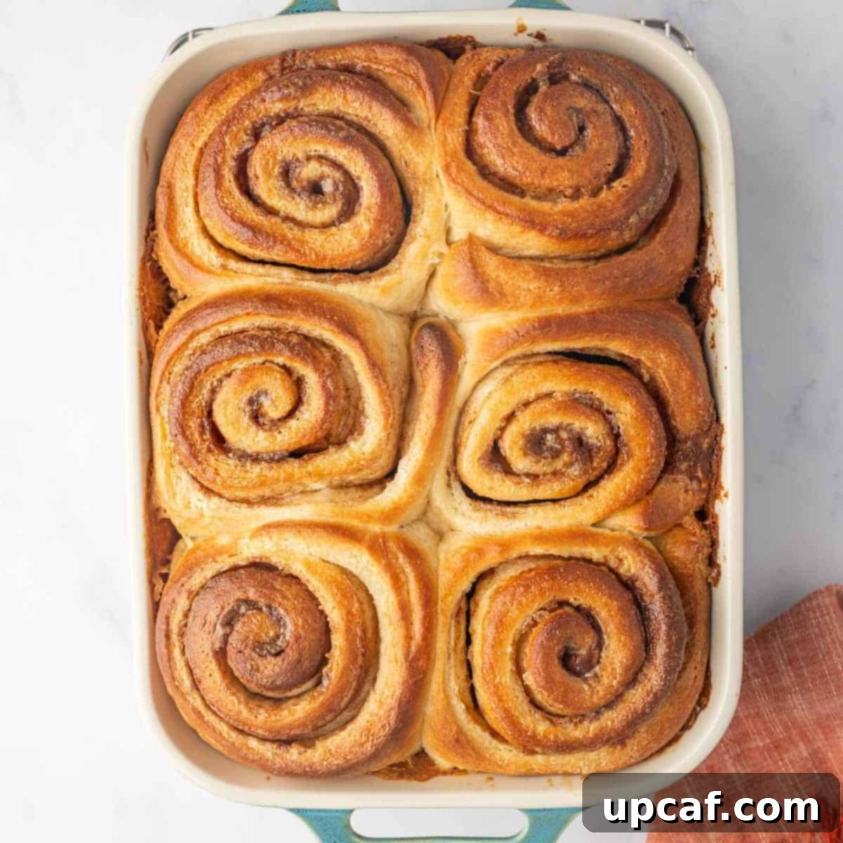 Bakery-Style Cinnamon Rolls: Extra Soft, Gooey, and Irresistibly Creamy 14 Baked Cinnamon Rolls in a Baking Dish