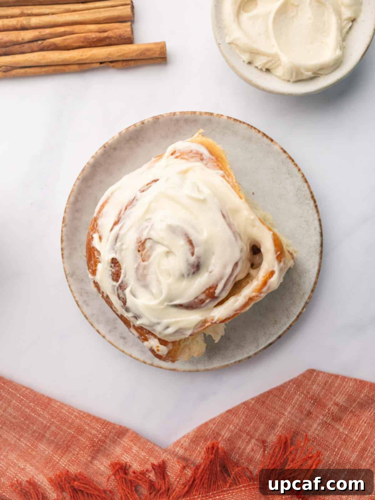 Bakery-Style Cinnamon Rolls: Extra Soft, Gooey, and Irresistibly Creamy 17 Single Cinnamon Roll on a Plate